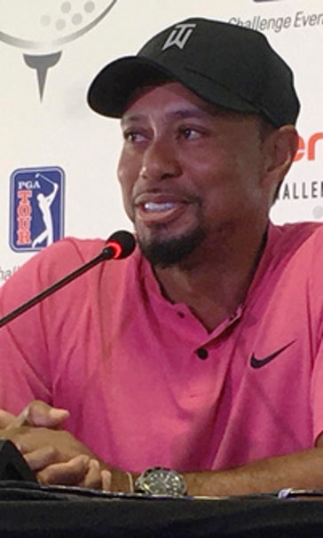 Tiger Woods counts it a success that he's playing golf again